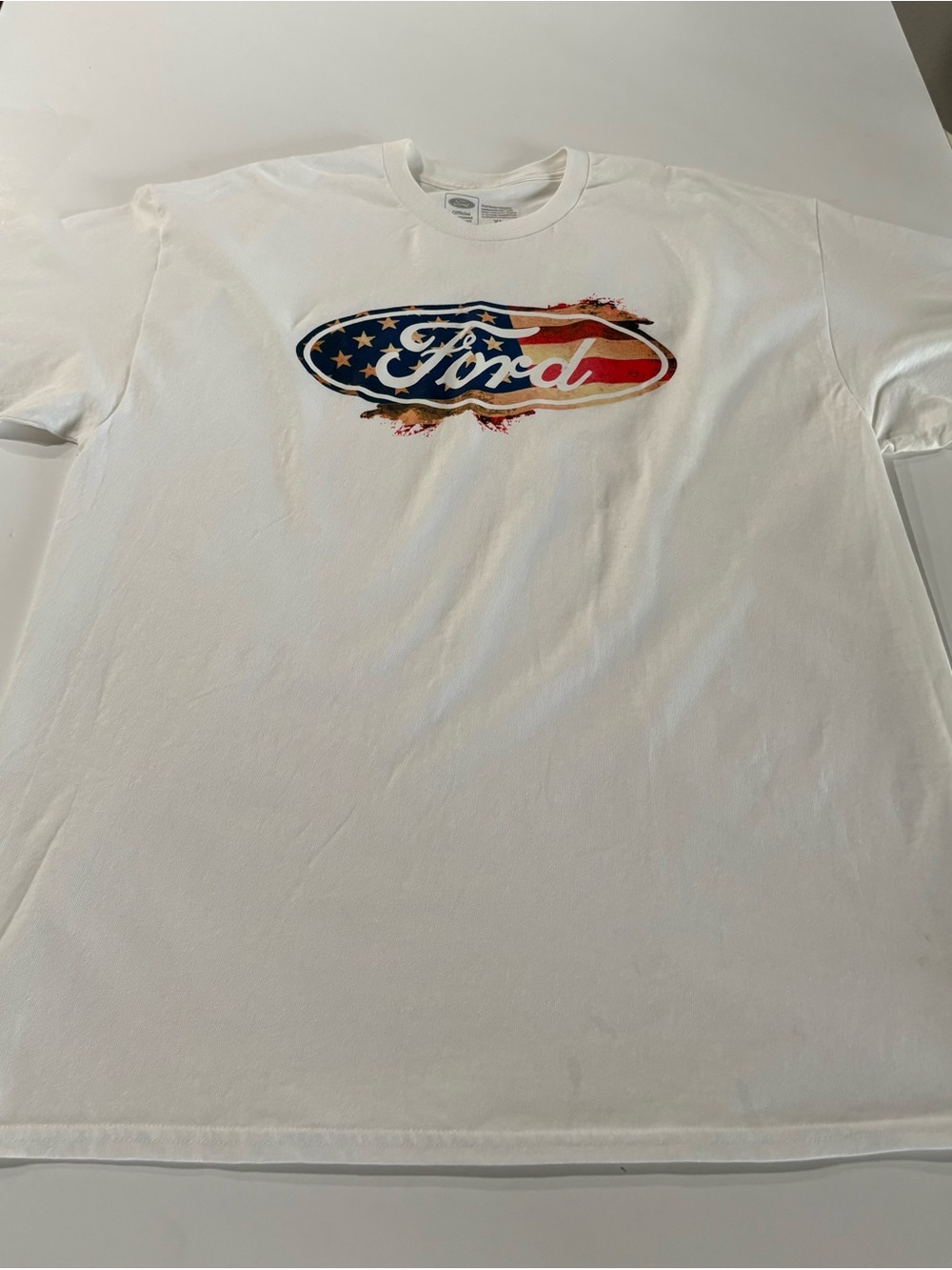 Ford White Short-Sleeve Graphic Tee with patriotic Ford logo in red, white &Blue